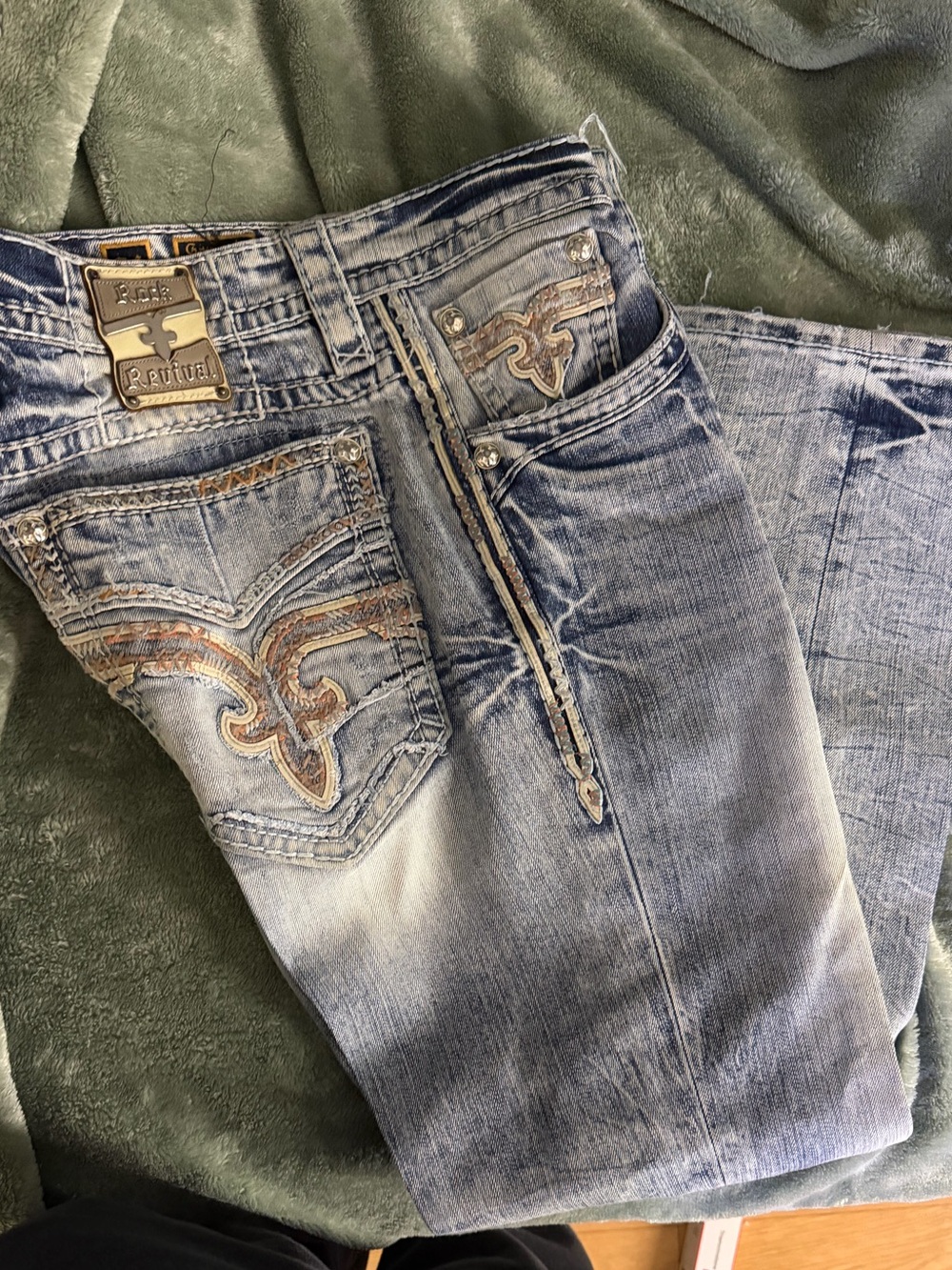Rock Revival Women’s Faded Blue Boot Cut Jeans with Embroidered Pockets